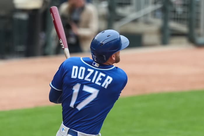 May 30, 2021; Minneapolis, Minnesota, USA; Kansas City Royals designated hitter Hunter Dozier (17) hits a solo home run against the Minnesota Twins in the ninth inning at Target Field. Mandatory Credit: David Berding-USA TODAY Sports